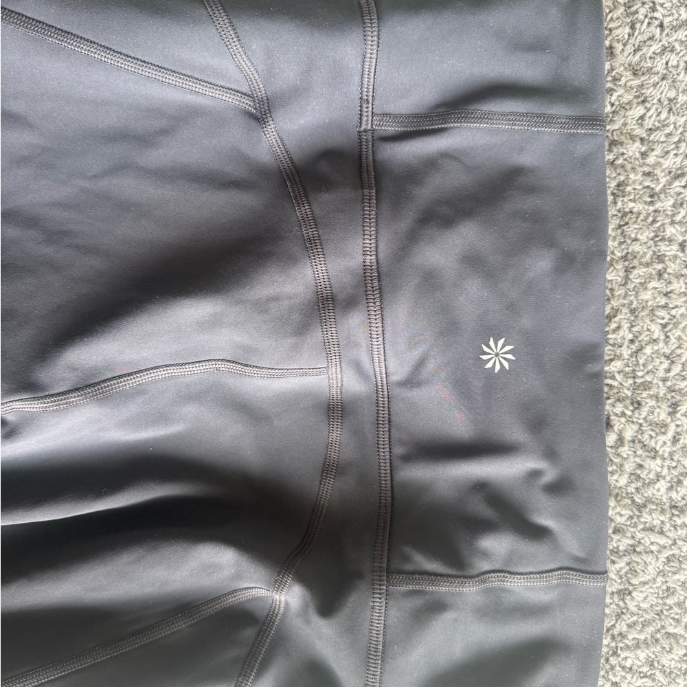 Athleta grey leggings with zipper pockets size small, boot cut